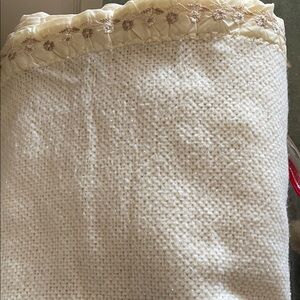 Blanket vintage with soft waffle edged with a pewter flower satin trimming